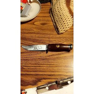 Wild Bill Bowie knife made of stainless steel in excellent condition.